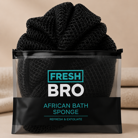 Black bath sponge in packaging with 'Fresh Bro' branding on a beige background